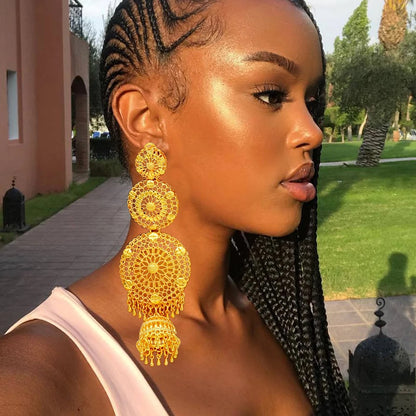 Sirena Gold Statement Earrings.